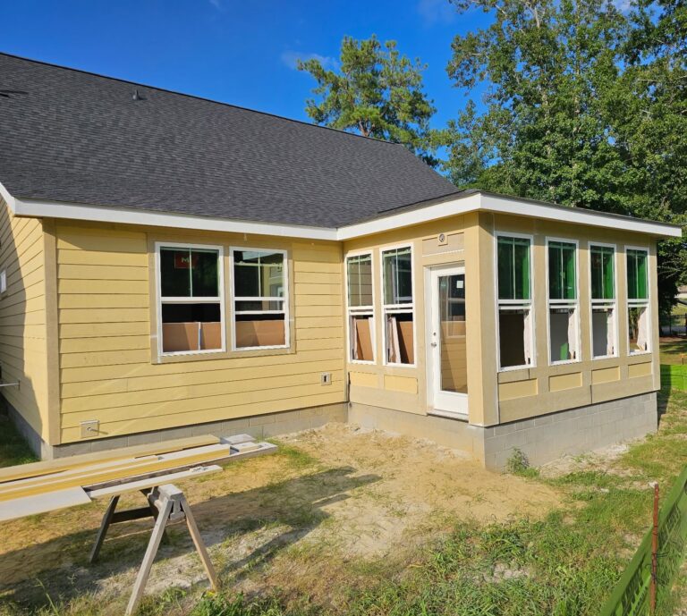 Residential home with new exterior trim and siding